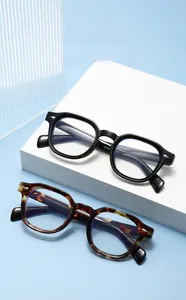 Detail of vintage square chunky sunglasses in black and tortoiseshell with metal accents