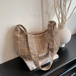 Retro plaid hobo bag with adjustable wide strap and embroidered power off label