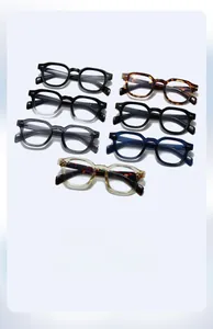 Detail showing seven pairs of colorful retro thick-frame sunglasses in various colors
