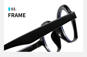 Detailed close-up of glossy black frame hinge and anti-blue light lens of sunglasses