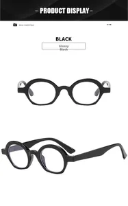 Detail view of vintage semi-round bright black sunglasses with wide retro temples