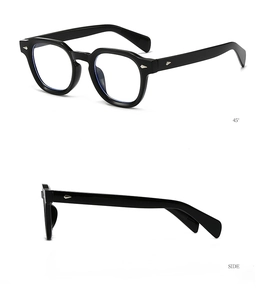 Detailed side view of vintage black thick frame sunglasses with silver diamond rivets