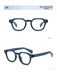 Detail view of transparent blue retro glasses frames with silver diamond rivets