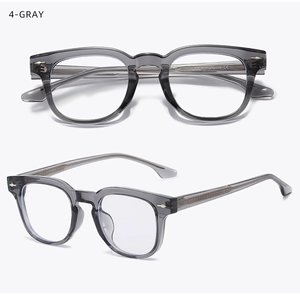 Close-up of gray transparent TR90 eyewear frames with metal rivets and visible core wire