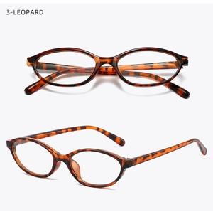 Macro view of retro oval leopard print eyeglasses frames with slim temples on white background