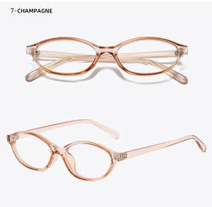 Macro view of vintage champagne oval eyeglasses frames with reinforced metal hinges