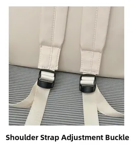 Detail of adjustable black buckles and fabric straps on the cream minimalist backpack
