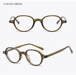 Detail of olive green oval frames with silver arrow rivets and translucent finish