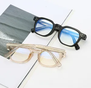Detail of vintage square thick frames with metal wire core and triple dot rivets