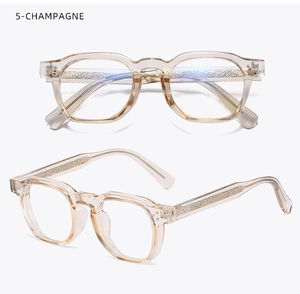 Detail view of champagne glasses with vintage metal core inserts and square frames