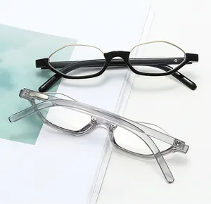Flat lay of retro polygon glasses frames in black and transparent grey finishes