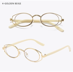 Close-up of golden beige oval glasses featuring a unique double-layer metal frame design