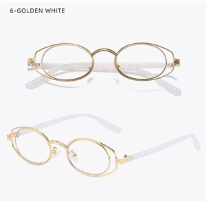 Detail view of oval double-wire golden metal glasses frames with white marble temples