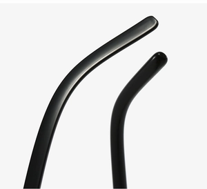 Detail view of the ergonomic matte black temple tips for vintage round polygon glasses