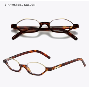 Macro detail of retro hexagonal tortoiseshell frames with golden metal inner rim accents