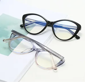 Detailed close-up of cat-eye frames featuring vintage metal arrow accents on temples
