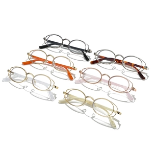 Futuristic oval eyewear set featuring unique double-wire metal frames in multi-color options