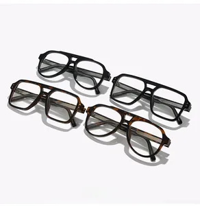 Macro detail of classic black and tortoiseshell double bridge pilot eyewear frames
