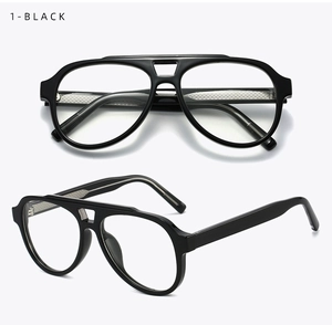 Detail of black double-bridge aviator frames with textured non-slip temples in a studio shot