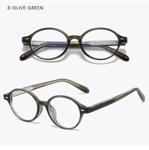 Macro detail of olive green acetate glasses frame with visible silver metal temple core