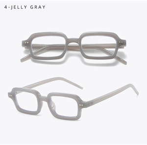 Detail view of Jelly Gray square glasses frame with silver rivets on a white background