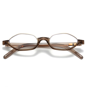 Retro polygonal tea-colored eyeglass frames with gold metal rim accents for a vintage look