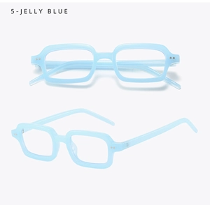 Detail view of jelly blue vintage square glasses with metal rivets and thick frames