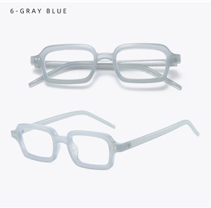 Detail of gray blue rectangular glasses frame with translucent finish and metal rivets