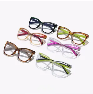 Multiple stylish cat-eye oversized glasses frames in various colors on white background