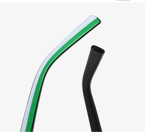 Macro view of contrasting green and black temples for cat-eye eyeglass frames