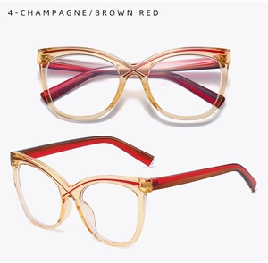 Detail of cat eye glasses frames with champagne front and brown red bow temples