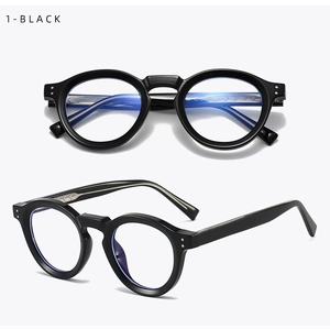 Dettaglio occhiali da sole rotondi retro in TR90 nero con rivetti e lenti anti luce blu