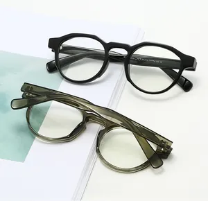 Detailed side view of vintage TR90 round eyeglass frames in black and translucent olive green