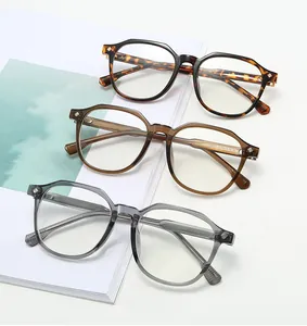 Detail shot of TR90 glasses frames in tortoiseshell and grey with metal hinges