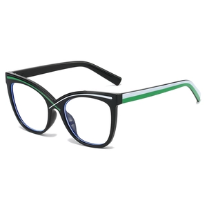 Trendy cat-eye glasses with black frames and green-white striped accents on white background