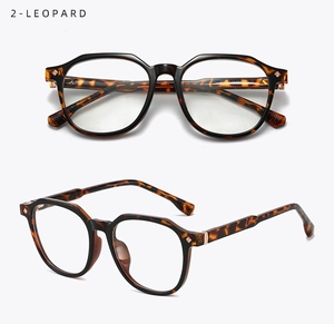 Detail view of leopard print TR90 glasses frame showing metal hinges and polygon shape