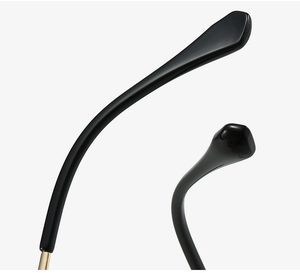 Detail of sleek black temples with gold metal accents on stylish butterfly frame glasses