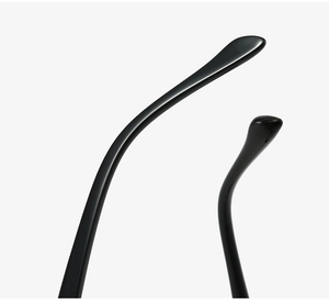 Macro shot of ergonomic glossy black glasses temples with polished curved tips