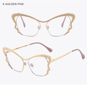 Detailed close-up of golden pink butterfly wing metal frame with unique side structure