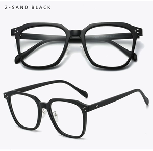 Detailed view of sand black TR glasses frames with silver rivets and metal nose pads