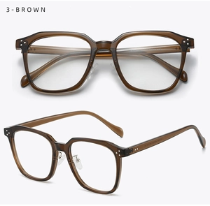 Detail of tea brown translucent frame with silver triple rivets and glossy finish