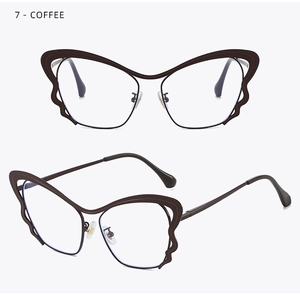 Detail view of coffee-colored butterfly wing frame glasses with unique wave edge design