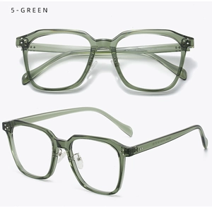 Detail view of large dark green TR eyewear frames with metal hinges and color code 5-GREEN