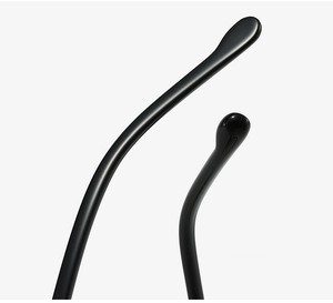 Detail of glossy black eyewear temple tip with smooth polished finish and ergonomic curve