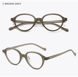 Detail of retro oval brown gray eyeglasses frame with metal hinges and integrated nose pads