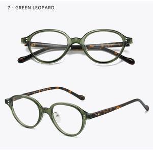 Detail of green translucent oval frames with classic leopard print temples and silver rivets