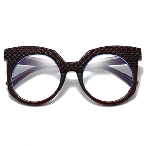 Montatura per occhiali bordeaux oversize con design trapuntato a rilievo superiore