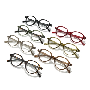 Retro small oval eyeglasses in assorted colors including black tortoise and clear grey