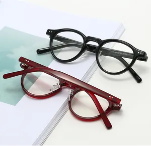 Close-up of vintage round TR90 frames with metallic nose pads and size details