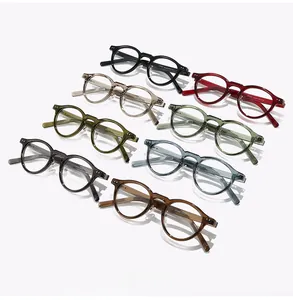 Macro shot of vintage round TR90 frames showing diverse colors and temple size engravings